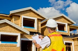 An image of an inspector performing a new home building inspection